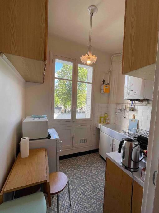 Appartment Close To Monuments ปารีส ภายนอก รูปภาพ